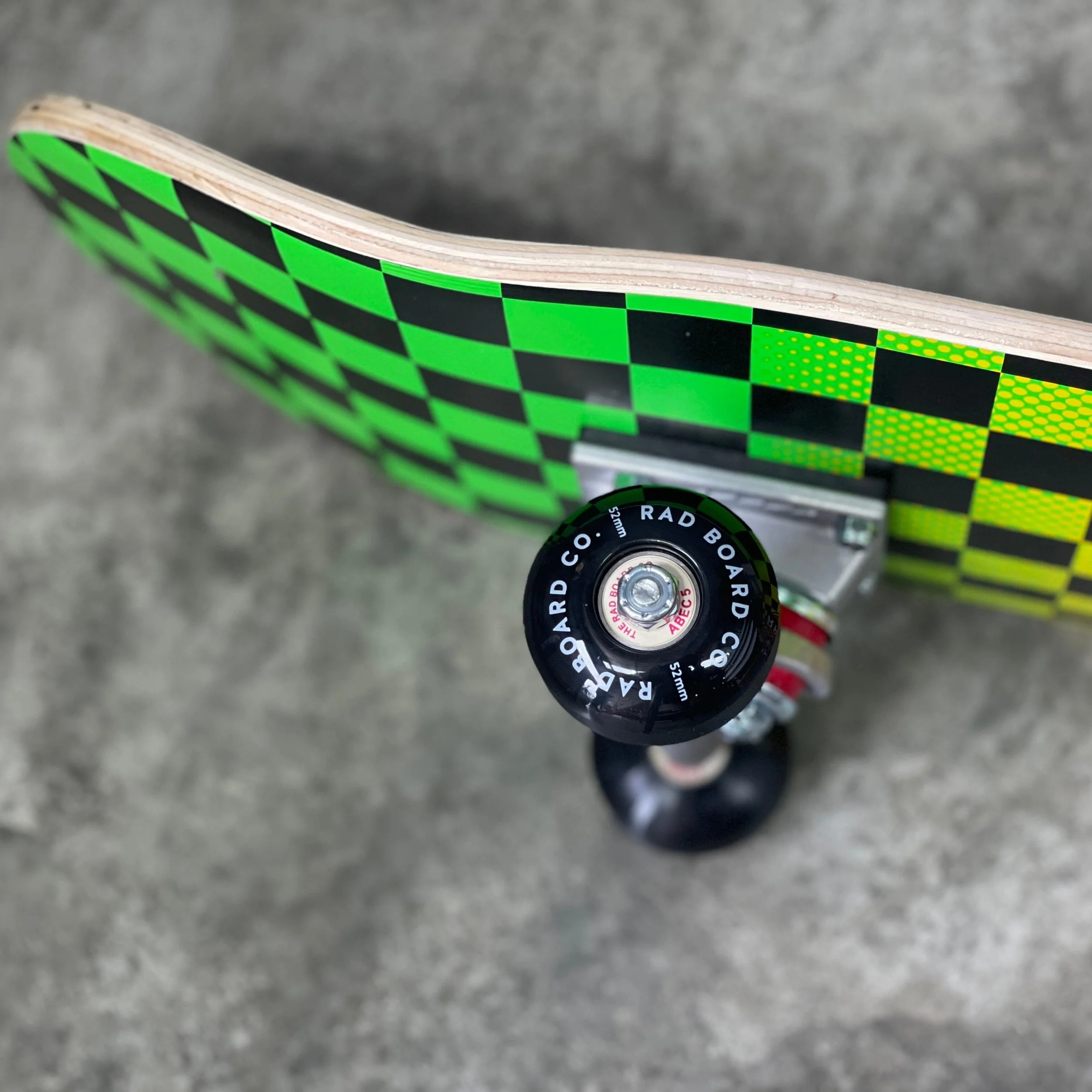 RAD BOARD CO. CHECKERS DUDE CREW COMPLETE NEON FADE 7.75 — SURF TRAX™